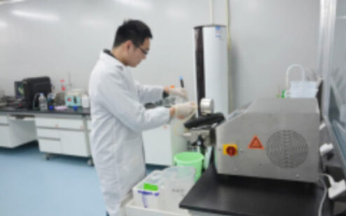 Technician working in a biosafety cabinet